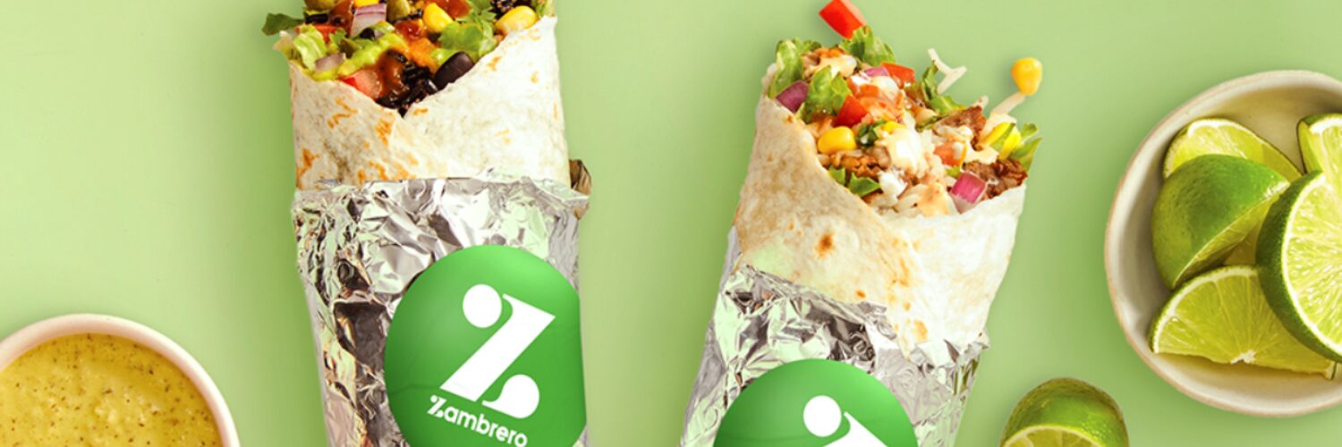 Zambrero burritos filled with fresh ingredients, wrapped in foil with Zambrero branding, surrounded by lime wedges and sauce — representing the healthy fast-food franchise supported by iWS Australia.